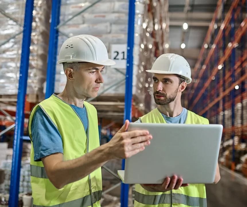 Workers using laptop